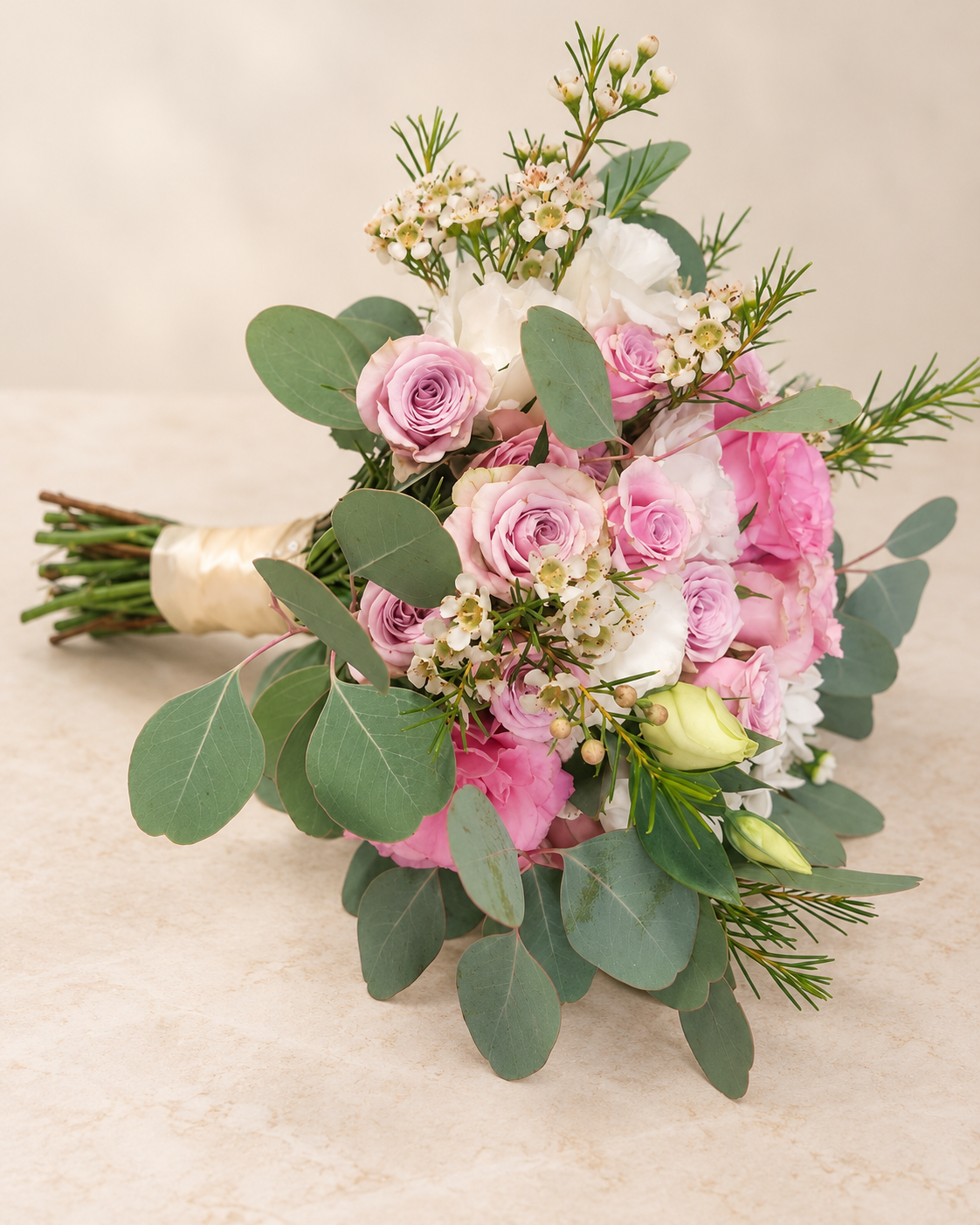 Garden-style blush wedding bouquet photographed from the side