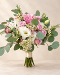 Blush pink and ivory bridal bouquet with roses, white flowers and eucalyptus