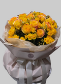 Luxury yellow rose bouquet with fresh bi-color roses in elegant wrapping
