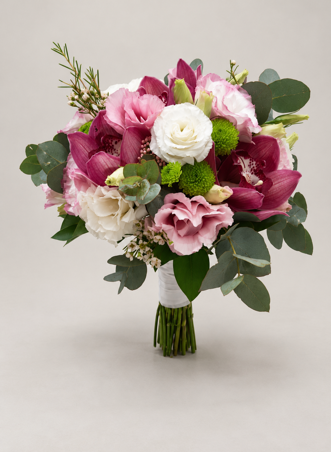 Orchid Romance bridal bouquet with burgundy orchids, blush and white flowers, and eucalyptus